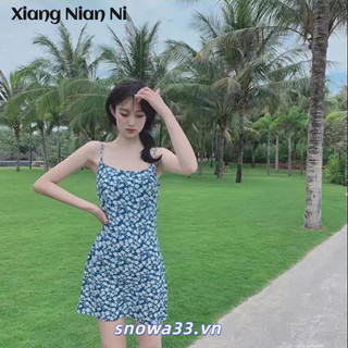 Xiang NIAN NI Mùa hè 2024 hoa treo váy cho phụ nữ nhỏ mùa hè Pháp váy ngắn giảm béo màu xanh gợi cảm