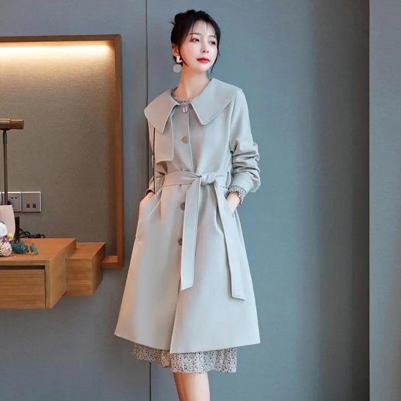 Áo khoác thông thường nơ thời trang dáng rộng phong cách Hàn Quốc Áo gió dài vừa phải dành cho nữ