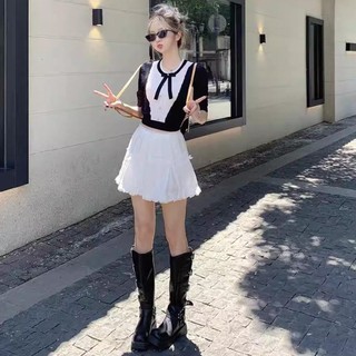Chân váy xếp ly đính nơ kiểu viền ren xinh xắn c081