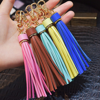 Mặt dây chuyền móc khóa tua rua da PU