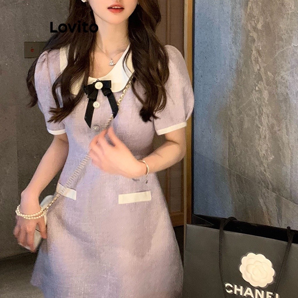 Đầm Lovito tay phồng cổ tương phản đính nơ phối túi giả màu trơn thường ngày cho nữ LNA17158 (Màu tím)