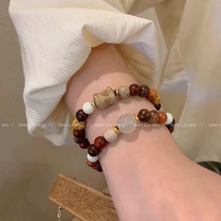 Mùa hè retro đính hạt vòng tay bé gái thời trang tròn đính hạt vòng tay bằng gỗ