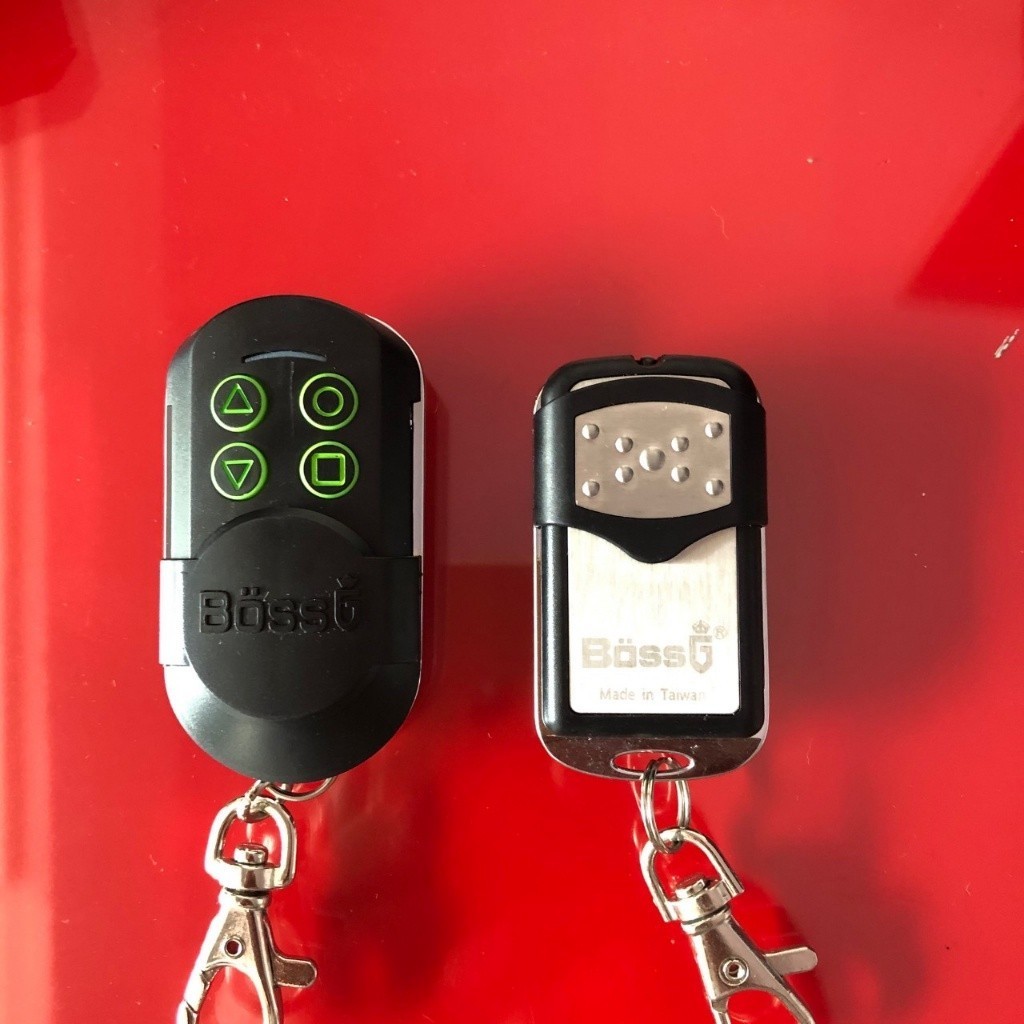 Điều khiển cửa cuốn BOSSDOOR Tân Trường Sơn 336 mhz mã nhảy chống sao chép