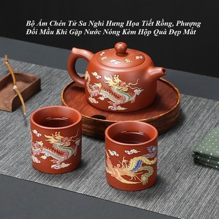 Bộ ấm chén tử sa nghi hưng họa tiết rồng phượng đổi mầu khi gặp nước nóng kèm hộp quà đẹp mắt