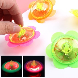 Đồ chơi con quay cánh hoa phát sáng, cù quay phát sáng