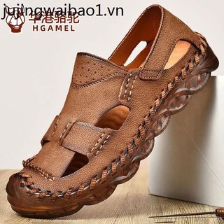 Huagang camel da dép nam da thật mùa hè mặc bên ngoài lái xe nam baotou giày đi biển nam bò tendon đế lỗ giày