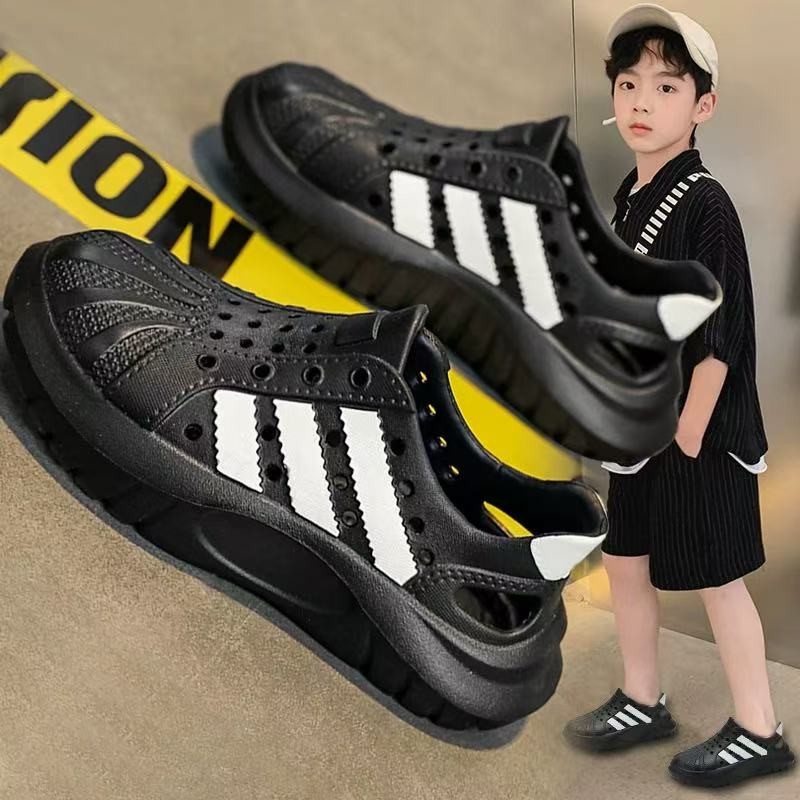 Giày hang Bé Trai Dép Trẻ Em Mùa Hè 2025 Mới Chống Thấm Nước Chống Trơn Trượt Đầu Bọc Dép Đi Biển Kéo Giữa Và Lớn Bé Trai