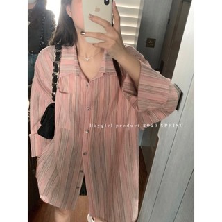Áo sơ mi sọc màu dáng rộng giải trí mùa xuân lười biếng dành cho nữ