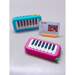 Đồ chơi âm nhạc phím đàn cầm tay, đàn piano mini đáng yêu cho bé