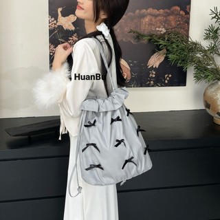 Ba lô nữ Huan Bu nơ nhẹ nhàng màu đen bột dễ thương ma ngựa ba lê phong cách mùa thu đông ngọt ngào cẩn thận túi cầm tay