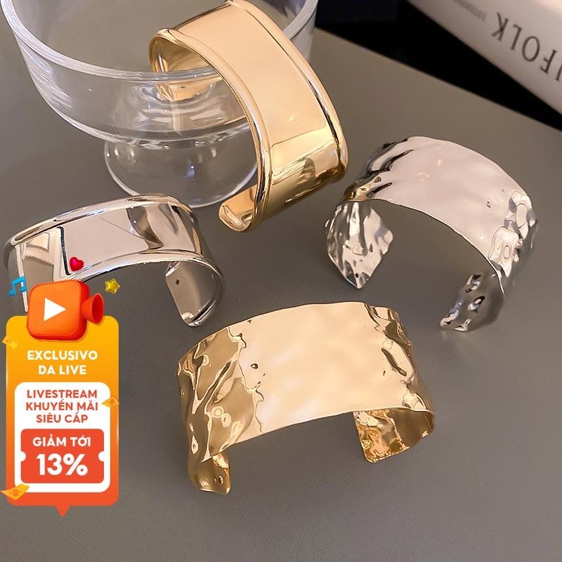 1 chiếc dây chuyền tay kiểu châu Âu và châu Mỹ không đối xứng cho nữ, trang sức tay thời thượng và tinh xảo.