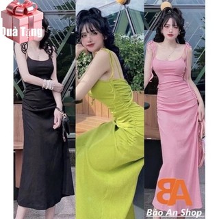 Đầm body nhún vặn lưng cột dây mang được 2 mặt