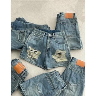 Quần short jean rách nhiều 7109.