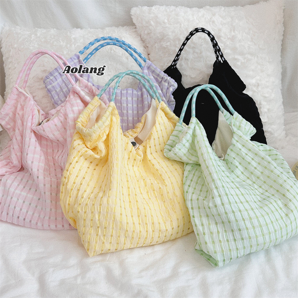 Túi đeo vai nữ Aolang Hàn Quốc Ins Lưới rỗng Dung tích lớn Đi lại Túi đi biển cầm tay