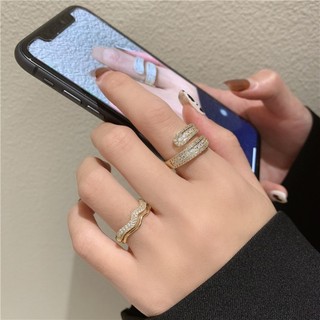 Nhẫn nữ mới có thể điều chỉnh với bộ mở không đều bằng đá trắng