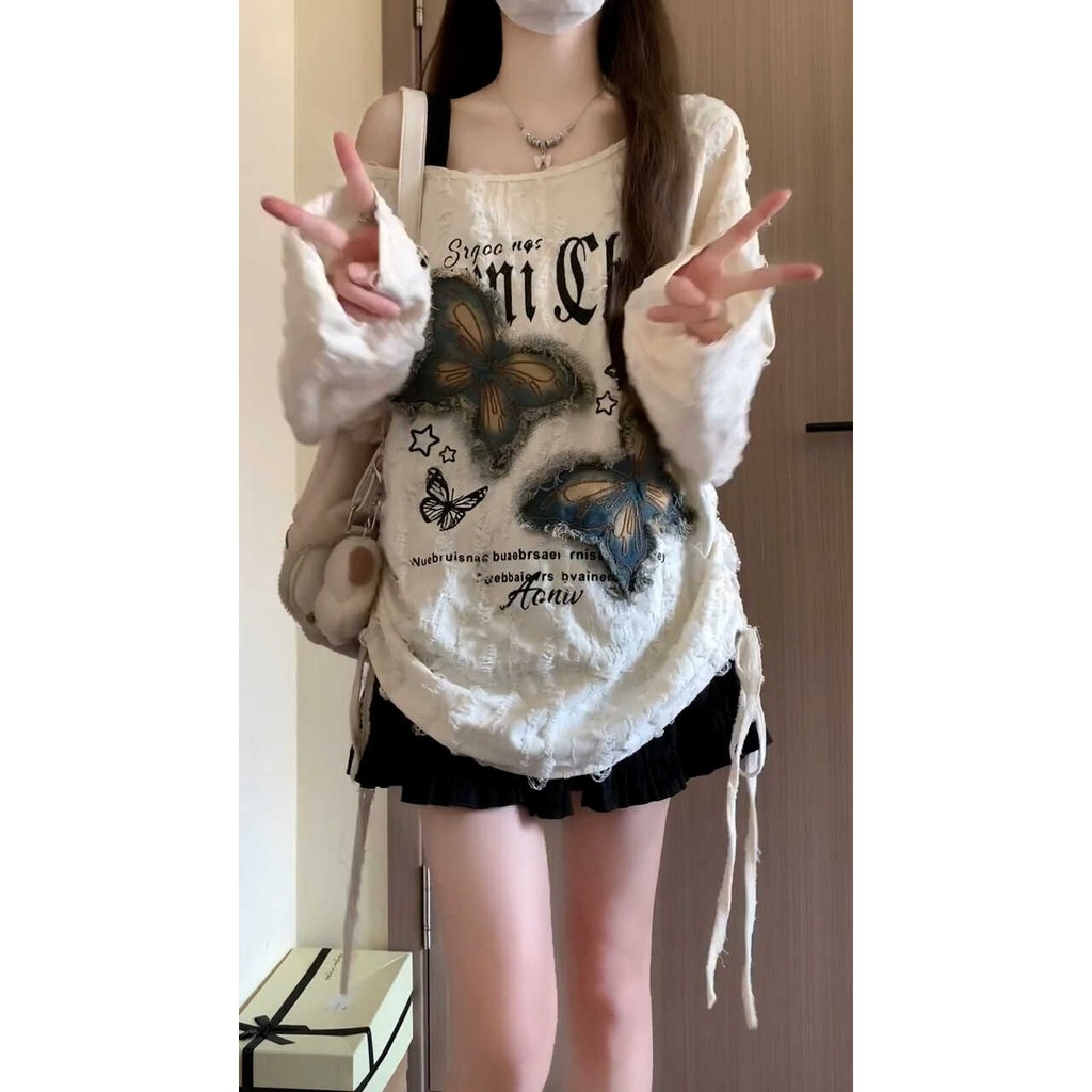 Áo thun nữ lệch vai cô gái cay Mỹ mùa thu dáng rộng Hàn Quốc Áo dài tay