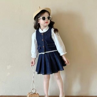  Bộ váy Jen gi-lê V21 cho bé gái từ 8-30kg gồm 3 chi tiết: áo sơ mi trắng áo gi-lê và chân váy xếp ly Xô Muslin 