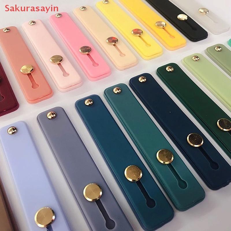 {Sakurasayin} Dây đeo cổ tay silicon đa năng Giá đỡ điện thoại Nhẫn đeo tay Điện thoại Dây đeo tay Đẩy kéo Grip Giá đỡ điện thoại Nhãn dán Giá đỡ điện thoại mới