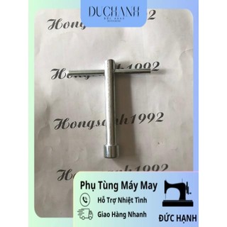 Khoá mở dao máy cắt đứng