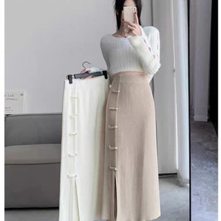 Chân váy dệt kim cài khuy phong cách Trung Quốc Jiashucheng váy ôm mông chữ A ống đứng dáng dài mẫu mới thu đông cho nữ