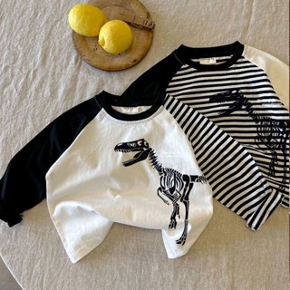 Áo thun dài tay cho trẻ em Mùa thu 2024 Phong cách mới Bé trai Bé gái Phiên bản Hàn Quốc Phim hoạt hình khủng Long Khóa màu Raglan Tay áo đáy Áo sơ mi tròn Ne