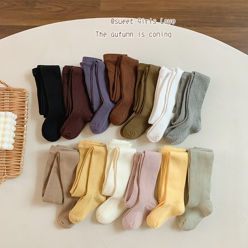 Quần legging bé gái mẫu mới mùa xuân thu 2024 Quần tất trẻ em loại a Quần tất liền thoáng khí phong cách Hàn Quốc mặc ngoài