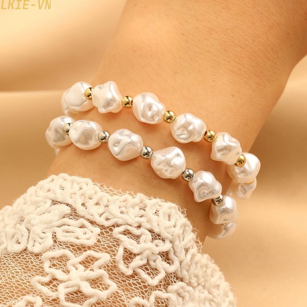 Distinctive Electroplated Bracelet with Imitation Pearls and Baroque Flair