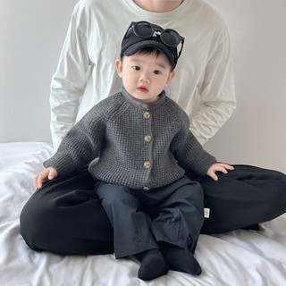 Quần áo trẻ em mới cho bé trai và bé gái Áo len dệt kim dài tay áo len cardigan nhỏ