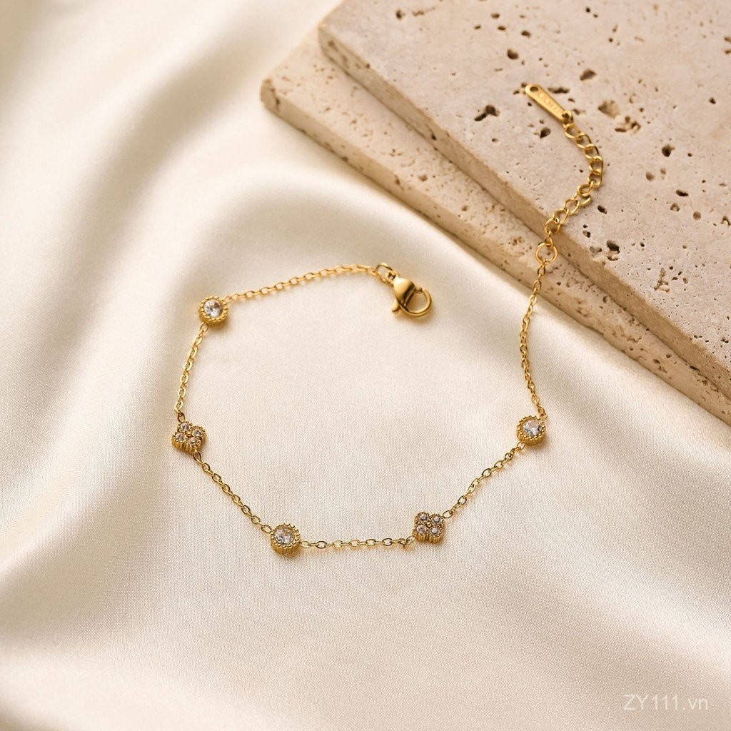 Vòng tay nữ thép titan zircon, mạ vàng 18k