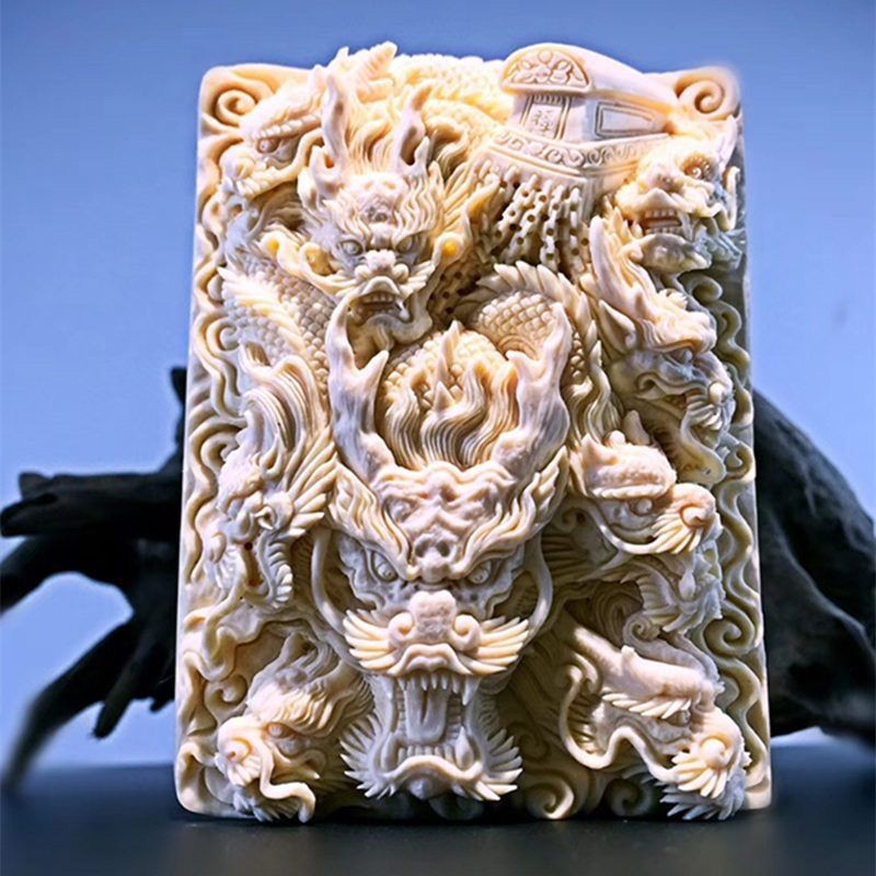 mặt dây truyền cửu long di quan làm bằng hạt cây ngà voi