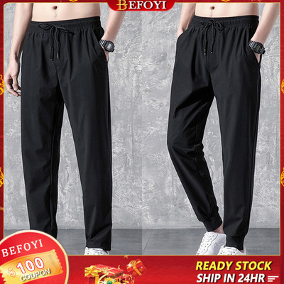 Quần dài nam Ice Silk Straight Leg Phiên bản Hàn Quốc Dây thun thể thao màu đen WW007