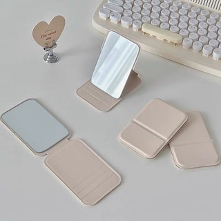 Gương mỹ phẩm để bàn có thể gập lại tiện lợi làm bằng da PU