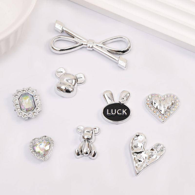 Kim Loại Bạc Phụ Kiện Gấu Jibz Croc Tình Yêu Nơ Thể Hiện Quyến Rũ Hoa DIY Ốp Điện Thoại Tóc y2k Phụ Kiện Trang Trí Giày Bé Gái Trẻ Em Quà Tặng