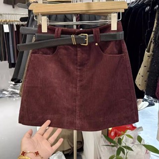 Chân váy nhung kẻ kẻ Jiashucheng váy chữ A tôn dáng gầy cạp cao mùa thu đông cho nữ váy ngắn ôm mông