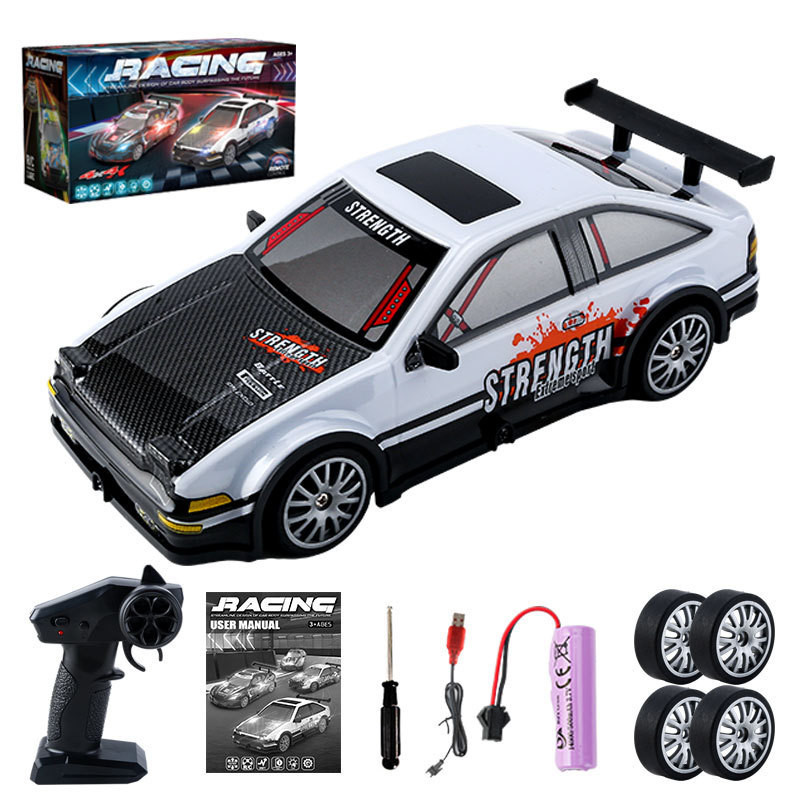 Ổ đĩa bốn bánh xuyên biên giới Đồ chơi điều khiển từ xa Racing 1: 20RC Chiếu sáng Racing AE86 GTR Xe