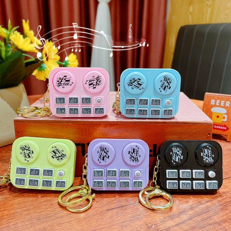 Dạ Quang Máy DJ Móc Khóa Hoạt Hình Sáng Tạo Giải Nén DJ Âm Nhạc Đồ Chơi Móc Khóa Cá Tính Cặp Đôi Túi Mặt Dây Chuyền