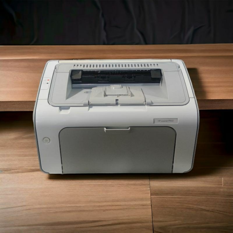 Máy in  HP1102 nhỏ gọn + hộp mực mới 100%+ dây nguồn, cáp in