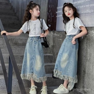  2025 Quần áo trẻ em mới chân váy denim cho bé gái chân váy midi sành điệu cho bé gái 