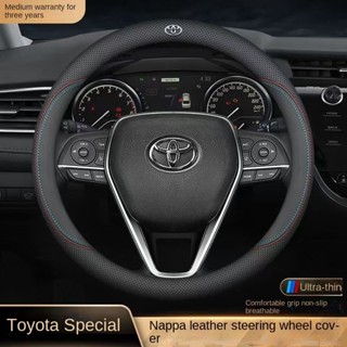 Bọc vô lăng bọc da thật chuyên dụng Toyota bọc chống trượt thoáng khí bằng sợi Carbon Bọc da vô lăng bọc kim loại logo xe ô tô Corolla Cross Camry RAV4
