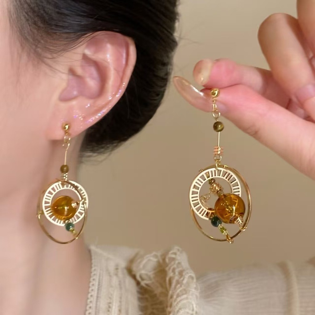 Bông tai hành tinh gió Maill