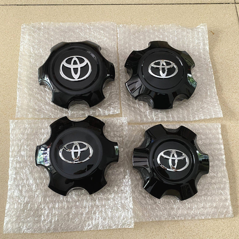 Thích hợp cho Toyota Độc đoán Đen Hub Cap LC120LC150 Prado 2700 4000 Hub Center Cap