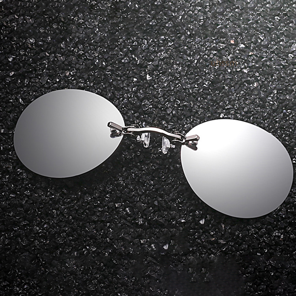 Kính râm Morpheus không vành, nổi bật trong lễ hội âm nhạc.