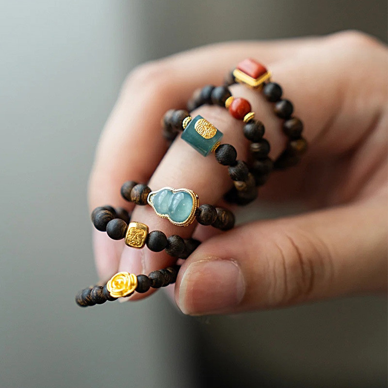 [Jinsuibaoge Flagship Store] Gỗ trầm hương Qinan tự nhiên nguyên bản Vòng hạt Xiaomi Ngọc bầu Zakira