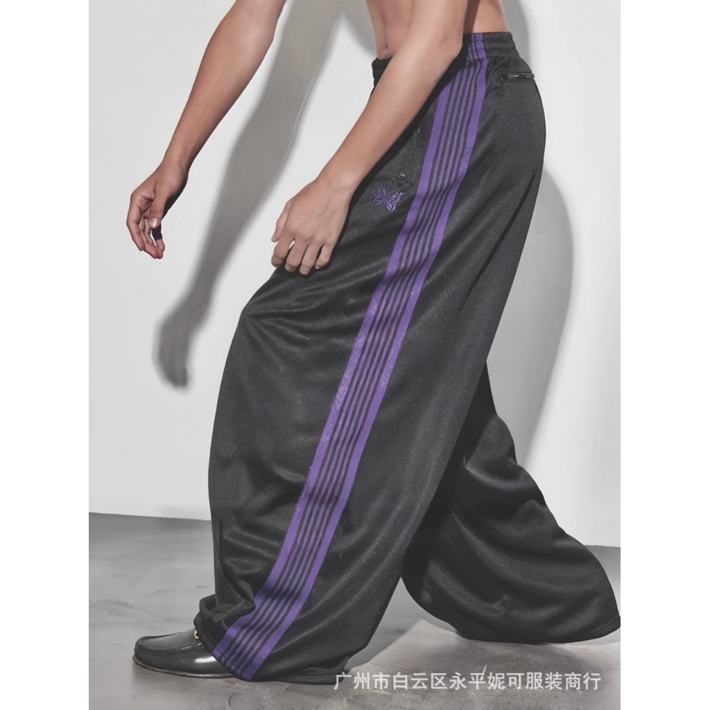 IXWW Needles Track HDWideLegTrackPant Black and purple wide-leg butterfly pants with stand-up collar