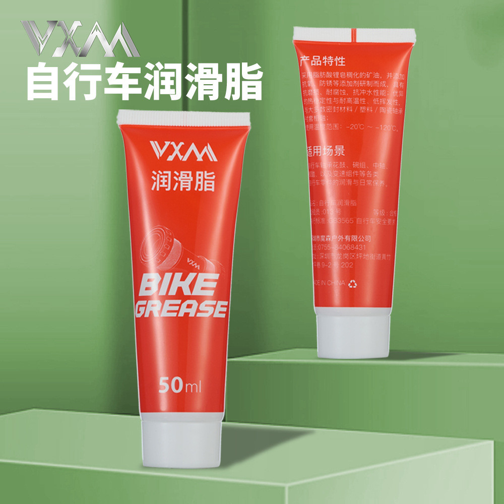 Xe đạp leo núi màu vàng kèm bộ phận bảo trì xe đạp gồm dây curoa và mỡ