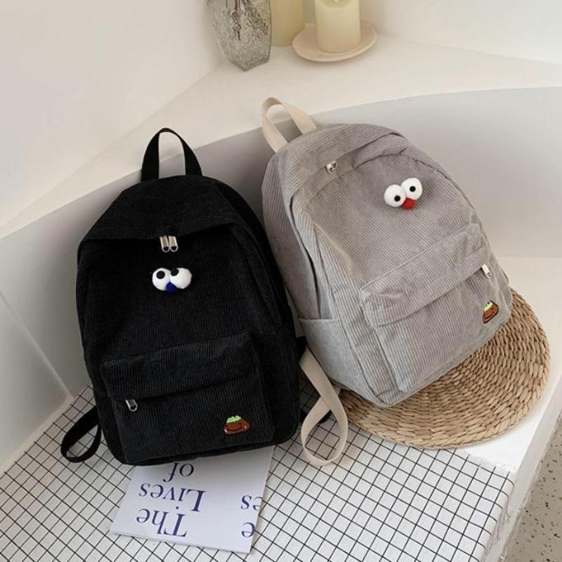 Ba lô học sinh vải nhung màu trơn màu mắt to dễ thương phong cách Hàn Quốc