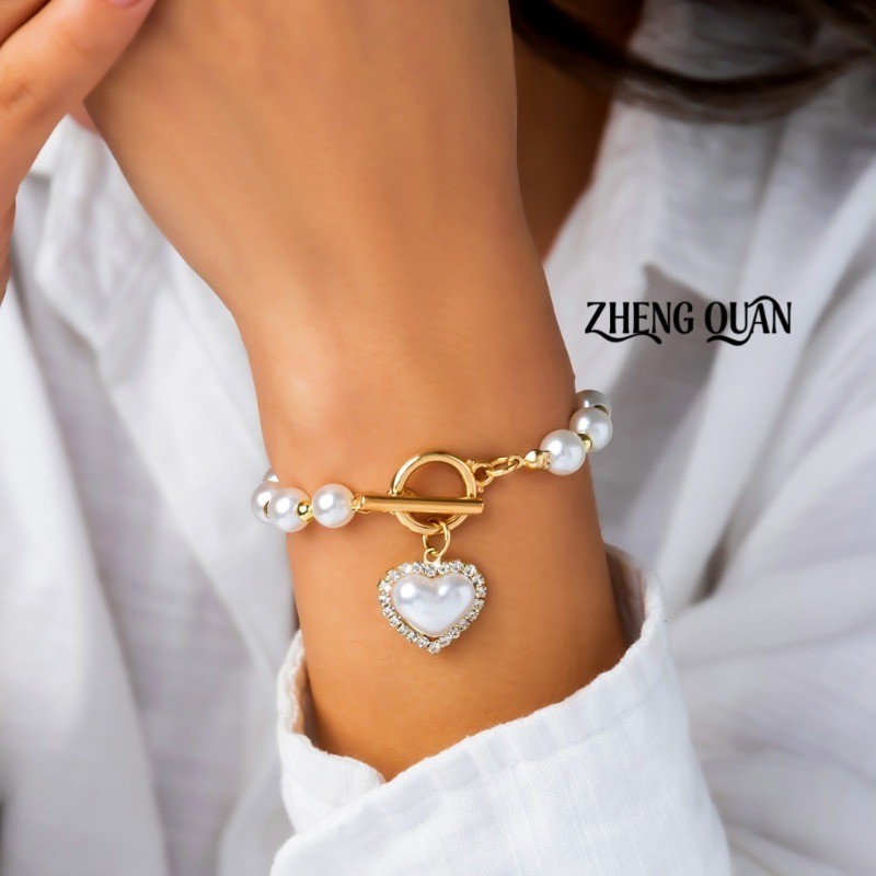 Trang sức Valentine: Ngoc Trai & Kim Cuong Gia - Vong Tay va Mat Day Chuyen Vang Thanlich Cho Ban Ga