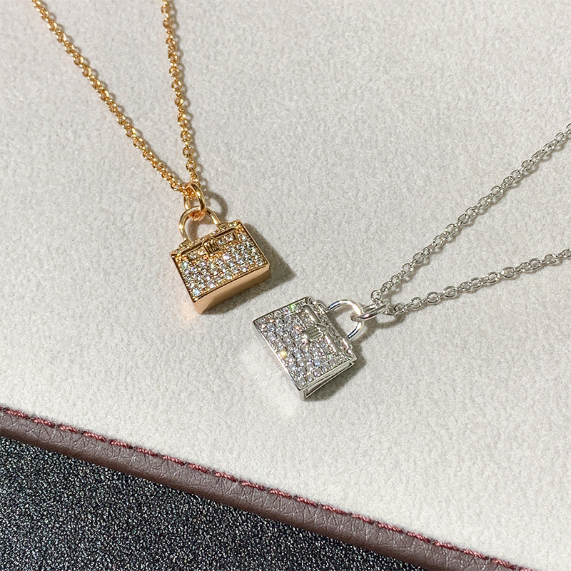 Full Diamond Kelly Kelly's luxury-style bag necklace is elegantly crafted as a collarbone chain in r
