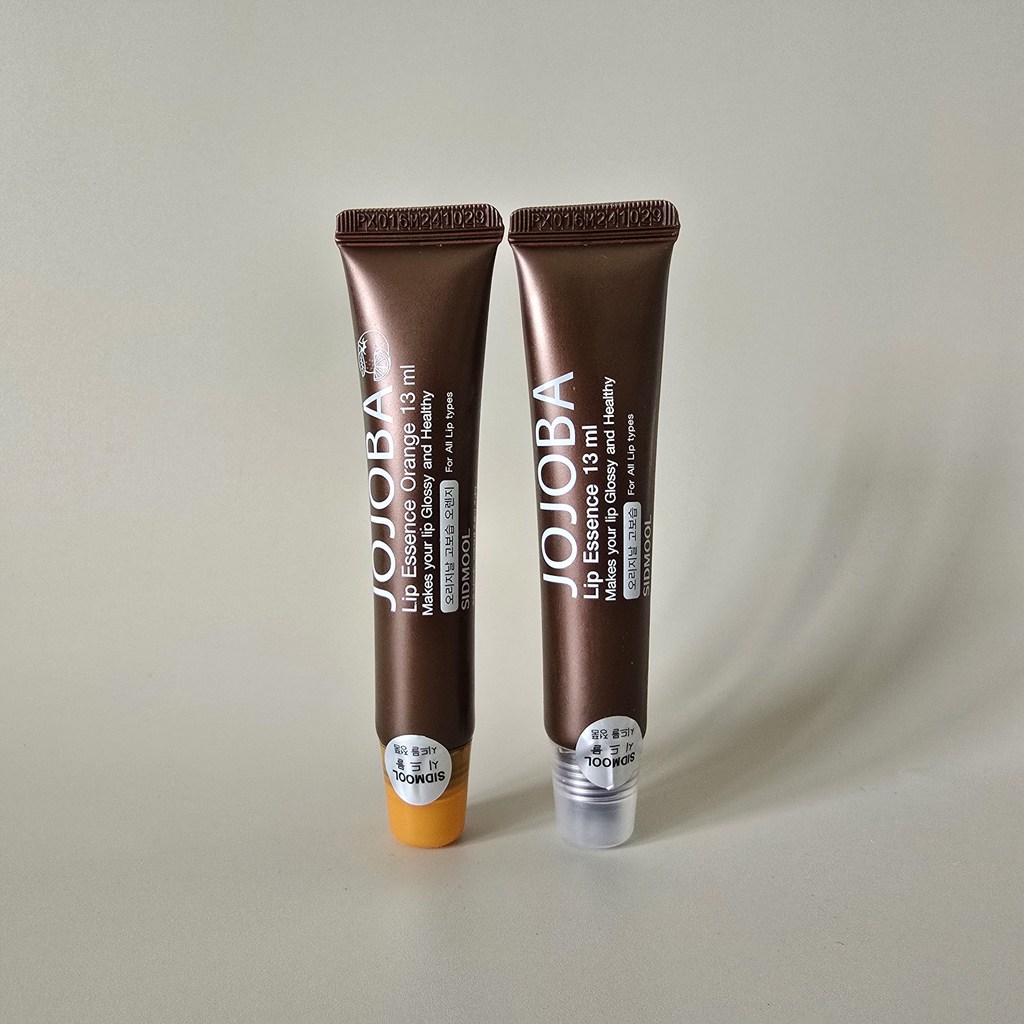 Son dưỡng môi dưỡng ẩm cao jojoba Hàn Quốc Dầu jojoba Dưỡng ẩm dưỡng ẩm Dầu môi Mặt nạ môi Son bóng 