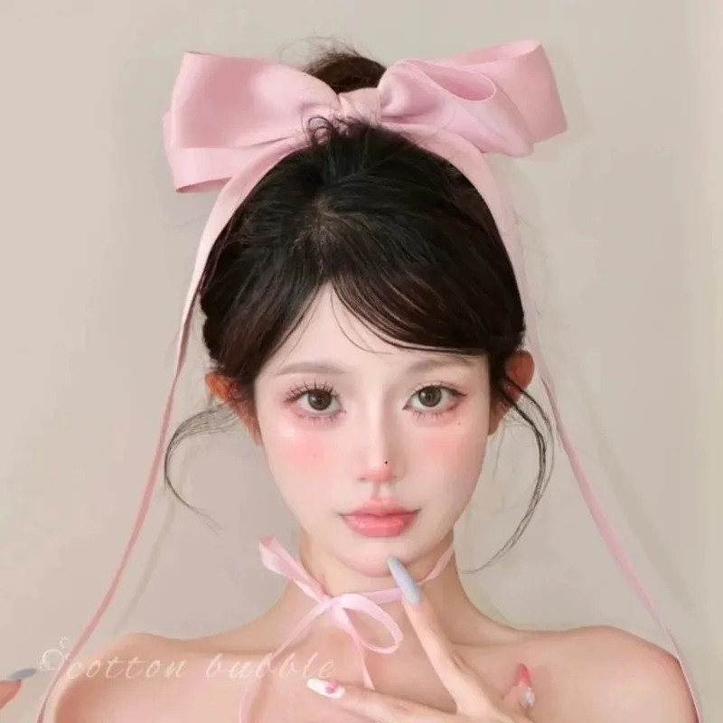 Đầu sau thỏ kẹp tóc với tua rua và nơ - Style Jennie